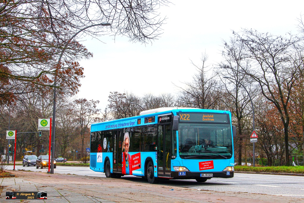 Ein Bild, das Text, Baum, drau�en, Bus enth�lt.

Automatisch generierte Beschreibung