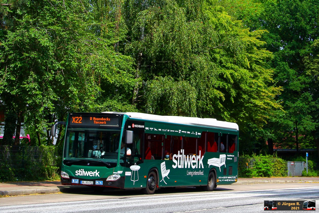 Ein Bild, das Text, Baum, drau�en, Bus enth�lt.

Automatisch generierte Beschreibung